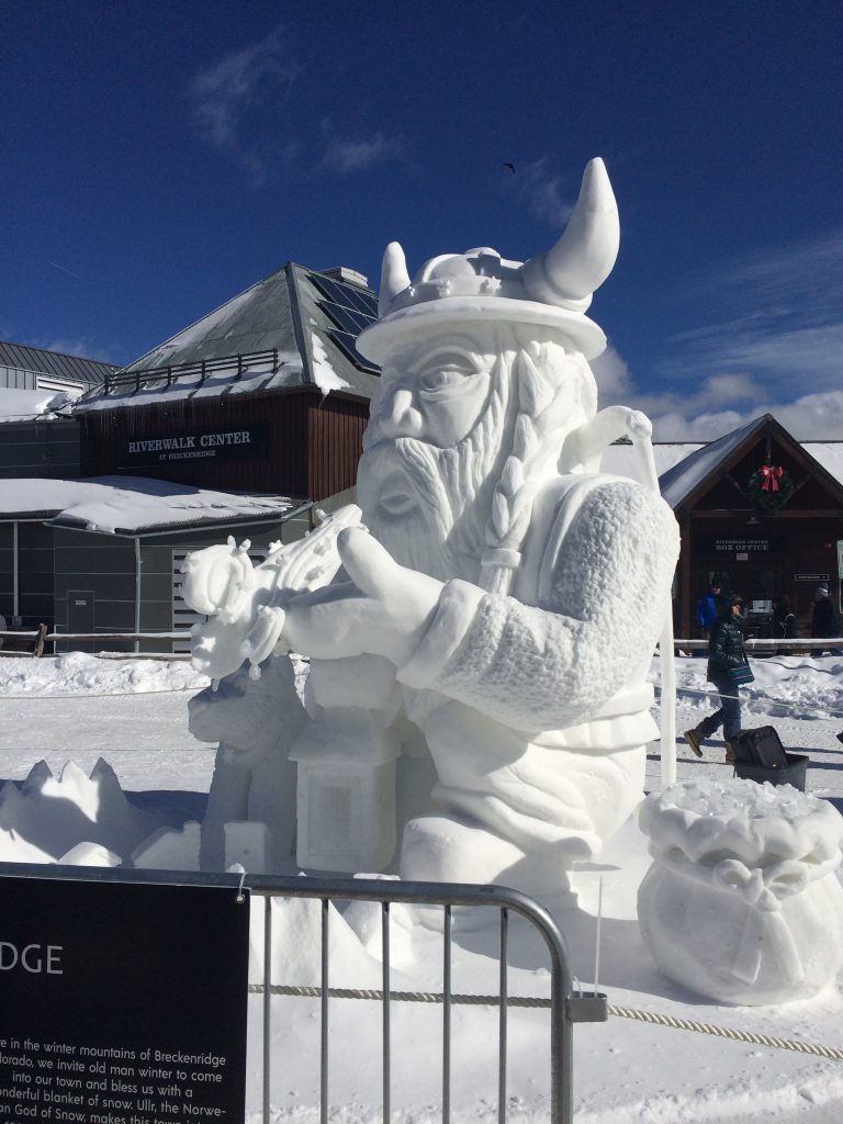Ice sculpture of the God Ullr making snow